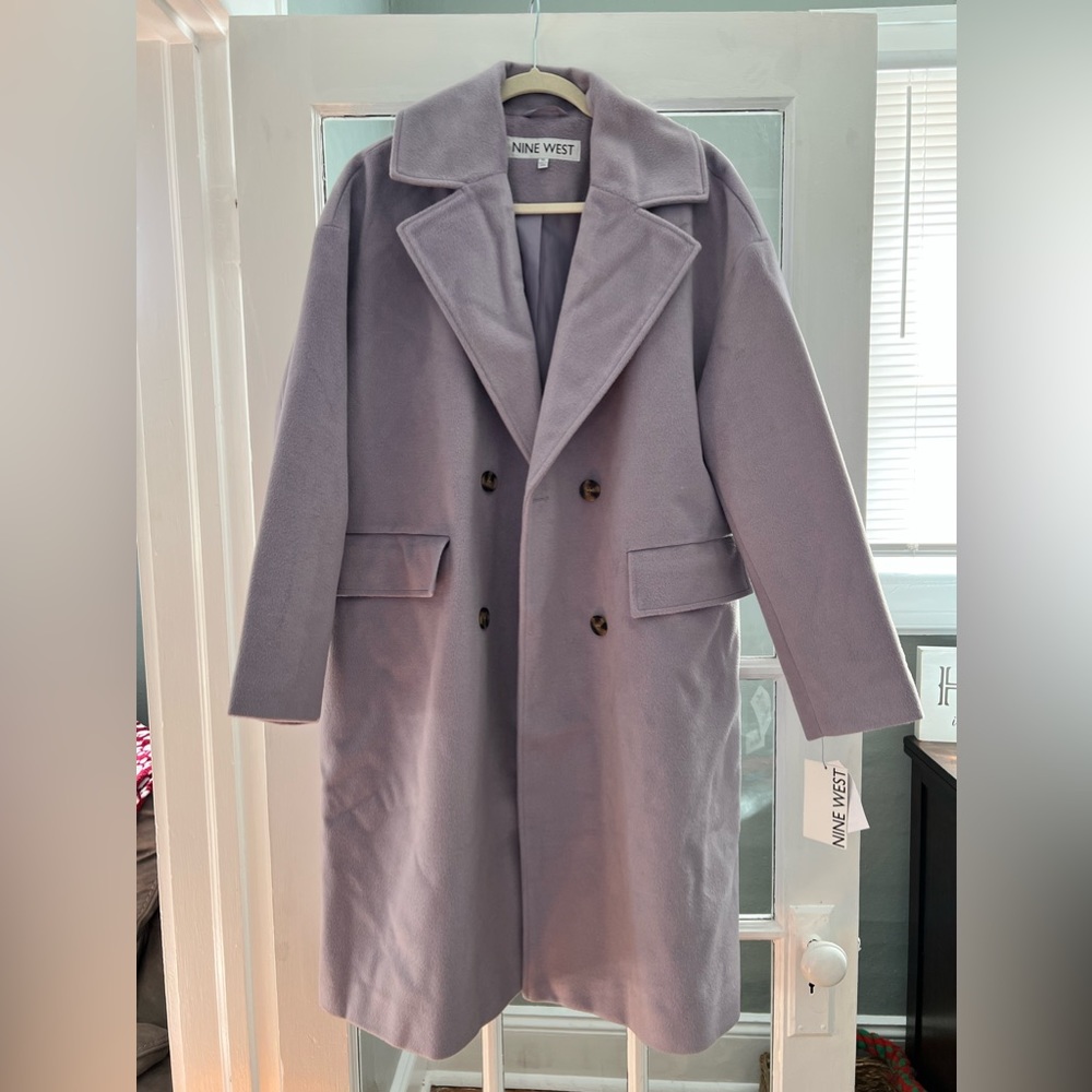 NWT beautiful Lilac size XL with two pockets in front